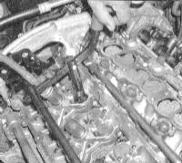  Замена маслоотражательных колпачков и клапанных пружин с тарелками Nissan Maxima QX